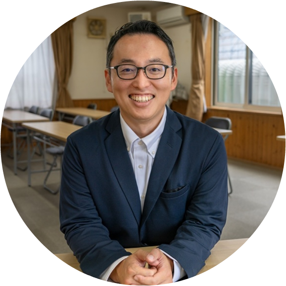 笑顔の塾長 渡邊先生の写真